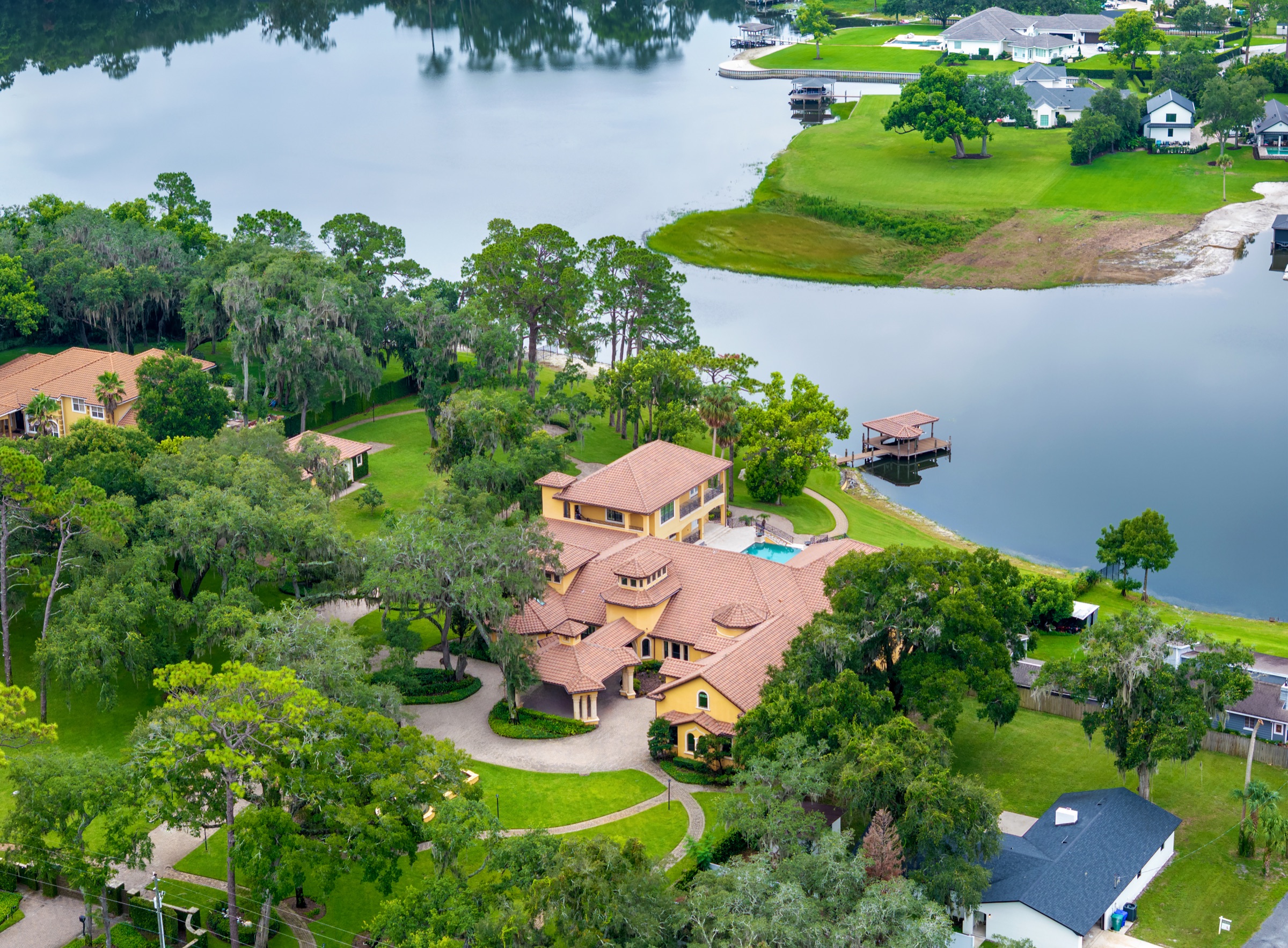 Aerial view of 1795 W Lake Mary Blvd, a lakefront estate in Lake Mary, Florida